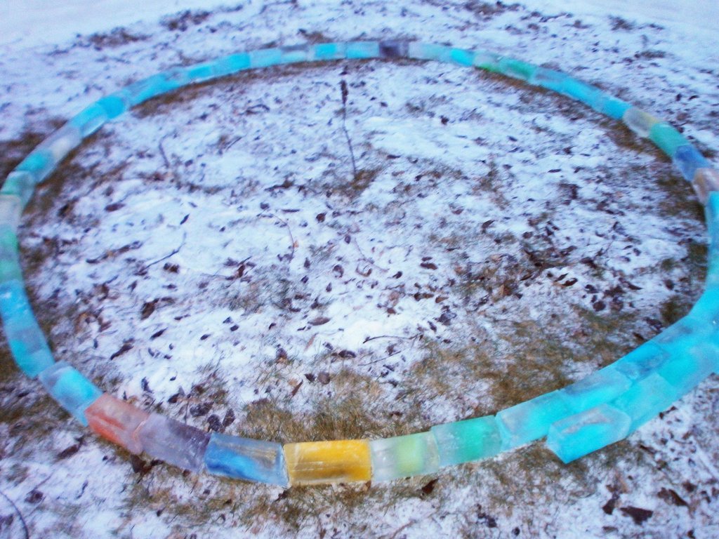 Then the first layer of ice blocks, built from milk cartons they collected, added coloring to, and froze.