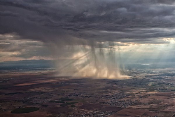 distant-storm-cloud-seen-from-airplane-window