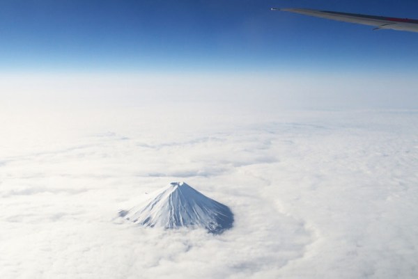 mount-fuji-from-an-airplane-above-the-clouds