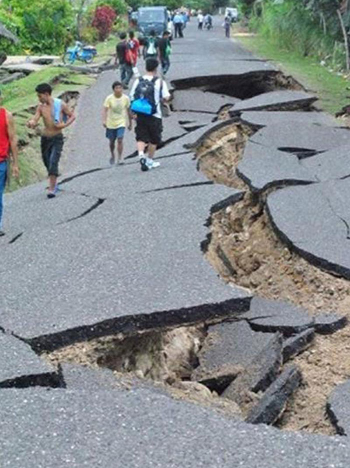 13) Huge crack in a highway after a 6.9-magnitude earthquake hit Negros and Cebu, 2012 (Philippines)