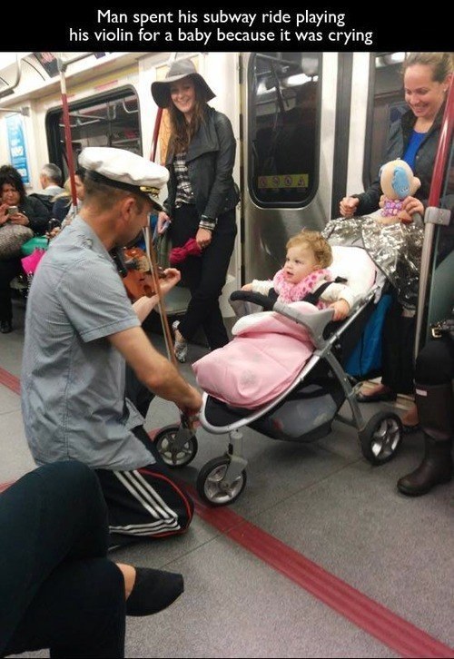This man comforting a baby: