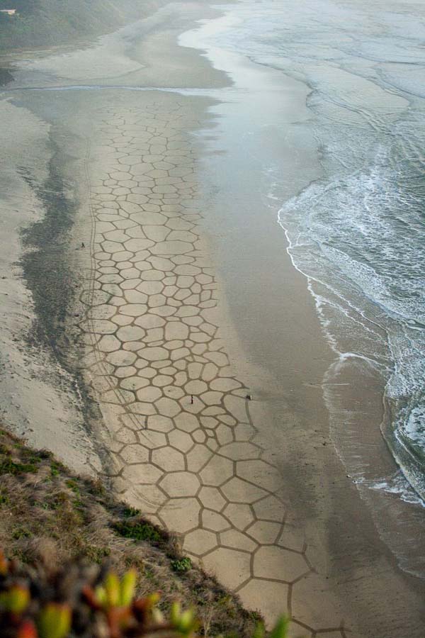 According to Andres, it only takes a couple of hours once the tide is low enough to create the designs.