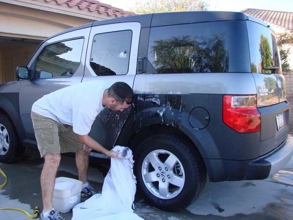 He also tried washing cars, but it turns out that wedding dresses don't hold water very well.