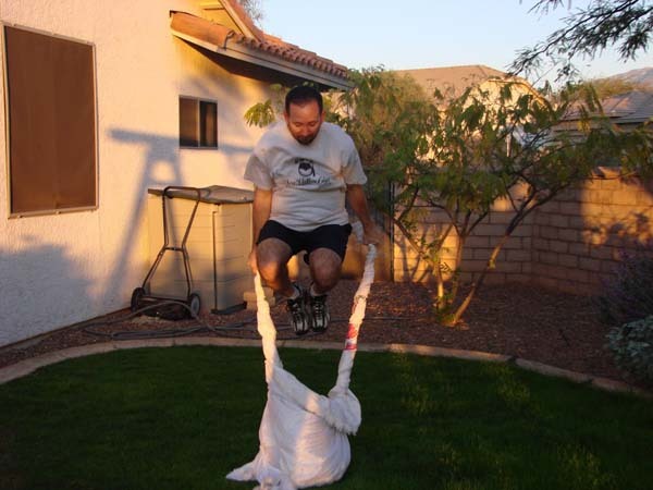 Kevin is now the world record holder for wedding dress jumps (that's 37, by the way).