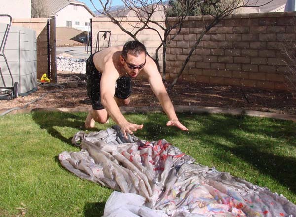 People suggested using it as a slip 'n slide. Little did they know, it was actually not great sliding material. At least he tried.