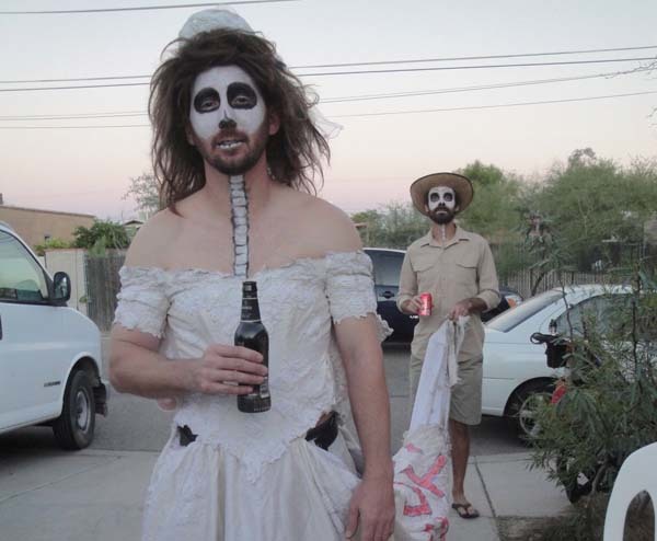 Tucson, AZ, hosts a Day of the Dead celebration every year. His costume was a smash hit.