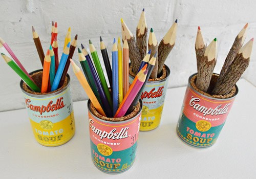 Pencil holders from old Campbell soup cans.