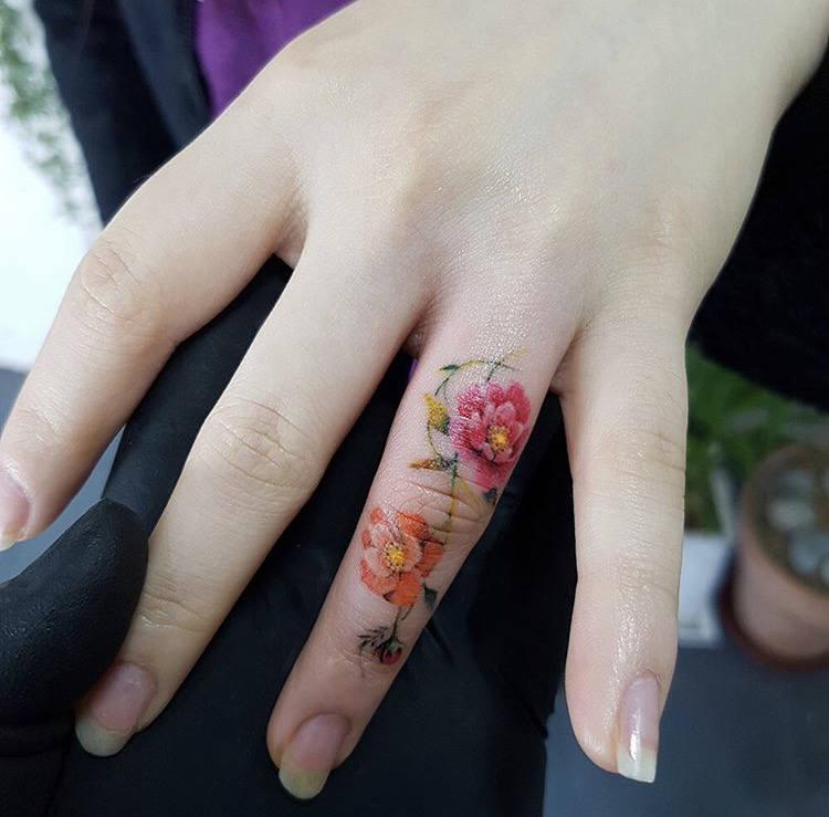 13.flower.finger.Delicate Finger Tattoo Flower