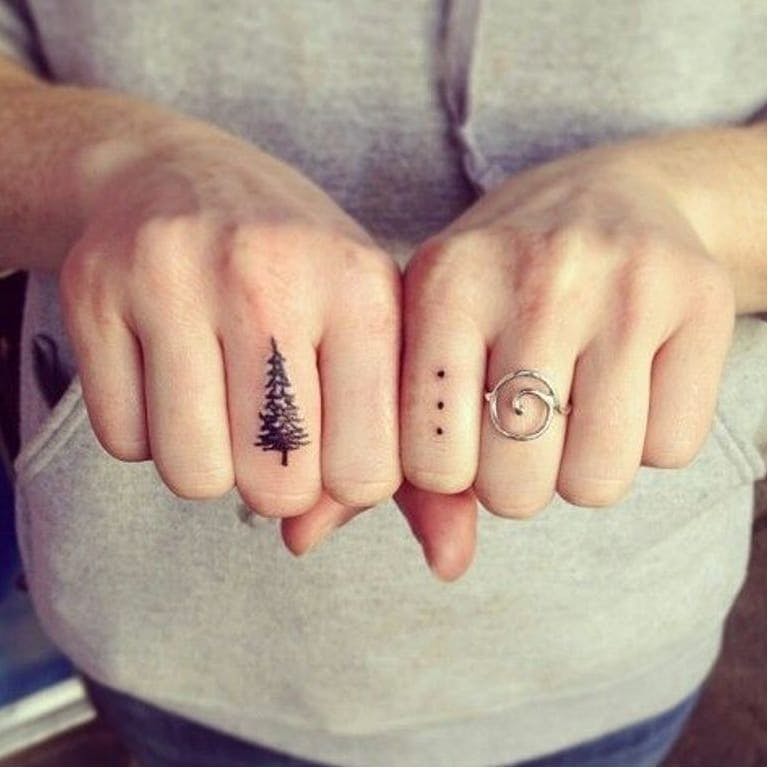 14.finger.dot .tattoo