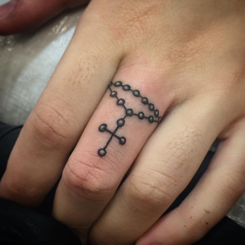 17.Rosary Tattoo On Finger