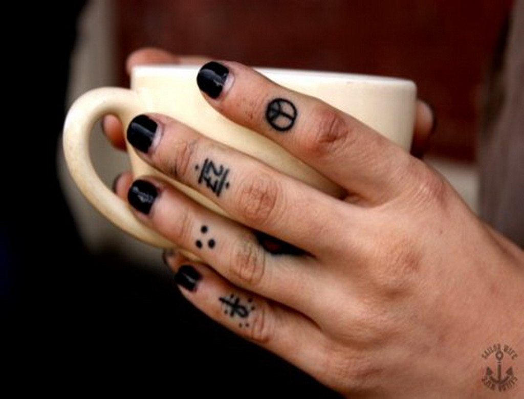 33.finger.symbols.tattoo.peace symbol and ankh finger tattoo for girls