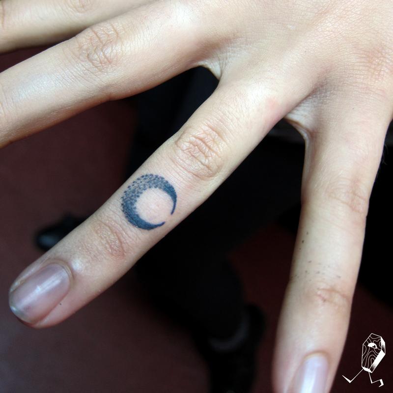 34.crescent moon finger tattoo