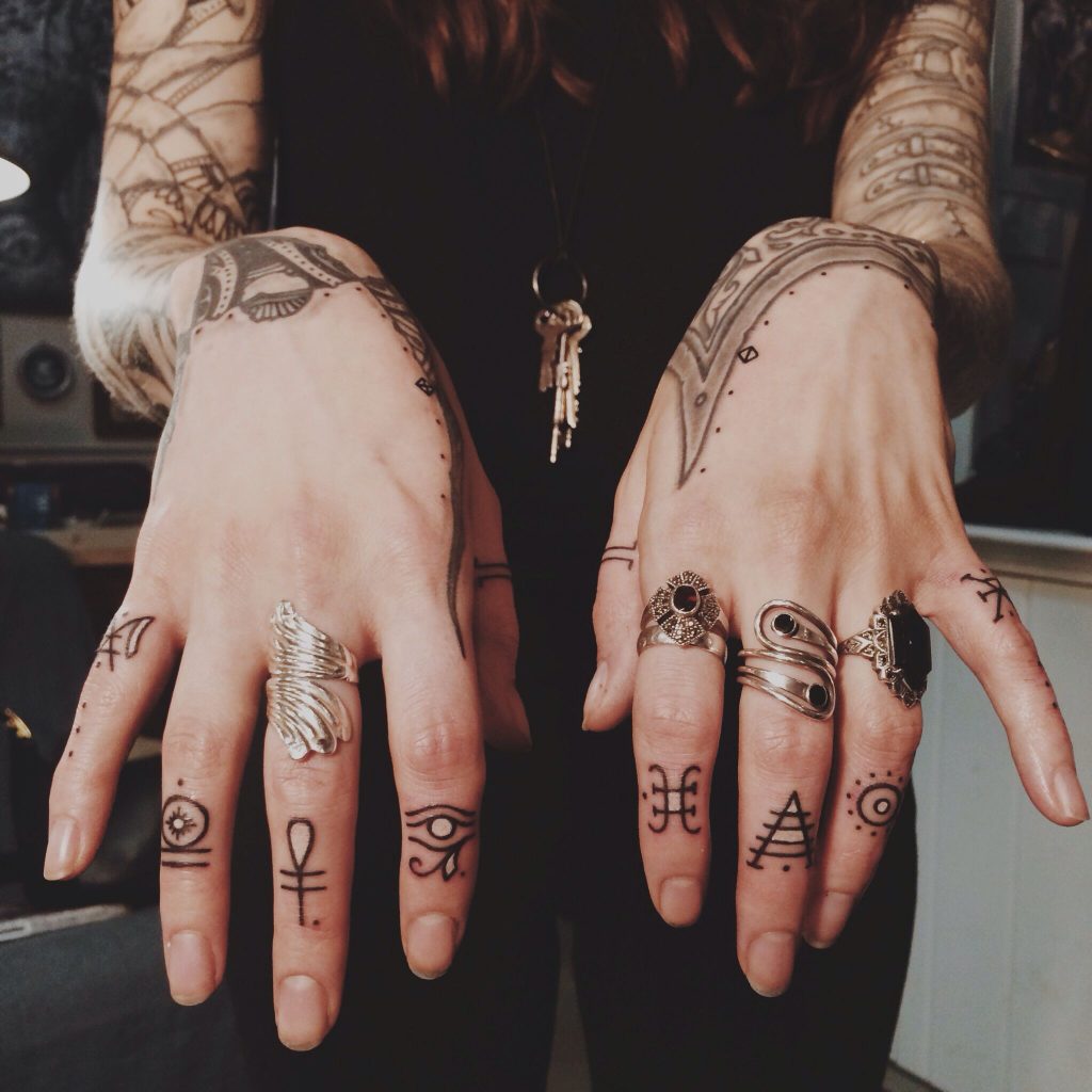 Egyptian finger tattoos