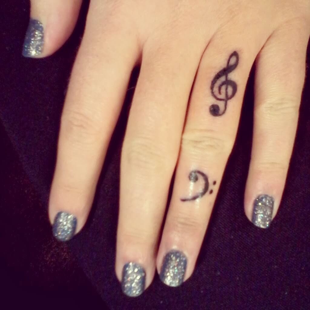 46.musical.notes .finger.tattoos