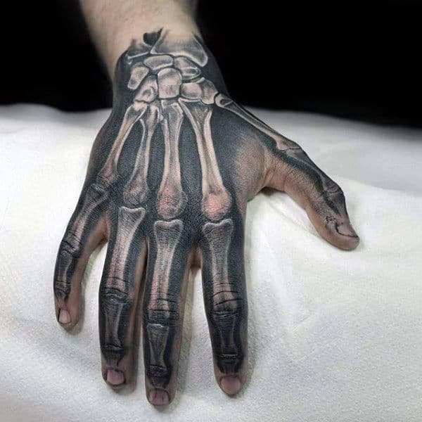 Bone Hand Tattoo  The Bridge Tattoo Designs