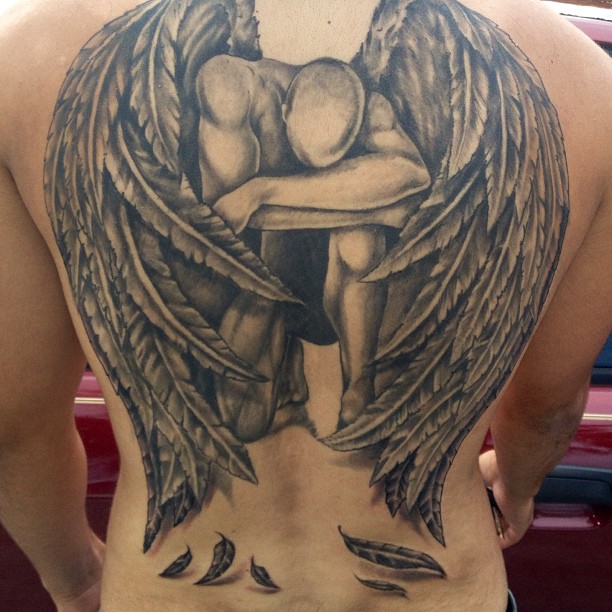 fallen angel tattoo on back