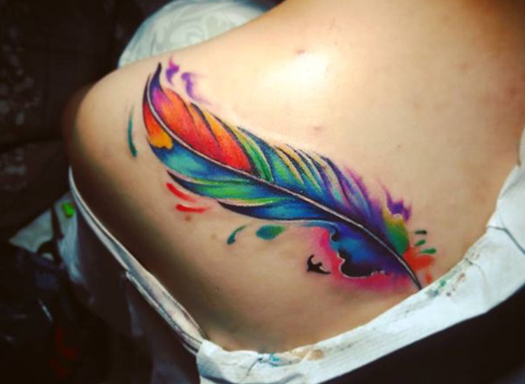 7. Dreamy Feather Tattoos - wide 4