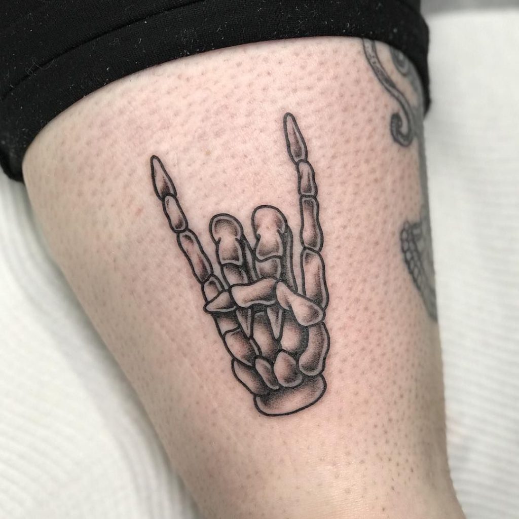 25 Frighteningly Cool Skeleton Hand Tattoo Designs  LaptrinhX