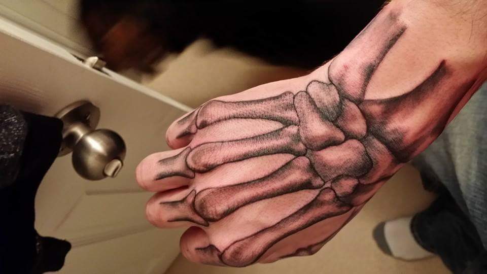 hand bone tattoo