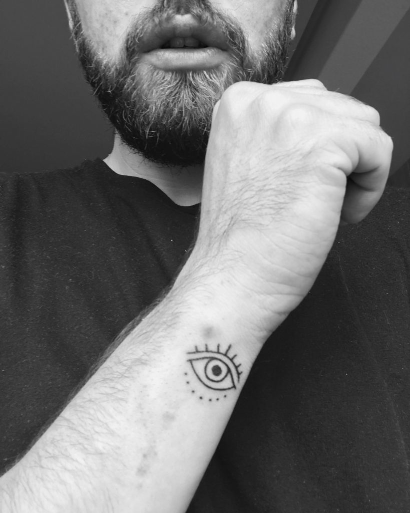 evil eye tattoo minimalist
