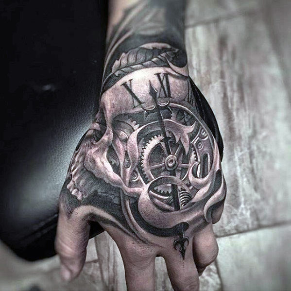 25 Frighteningly Cool Skeleton Hand Tattoo Designs