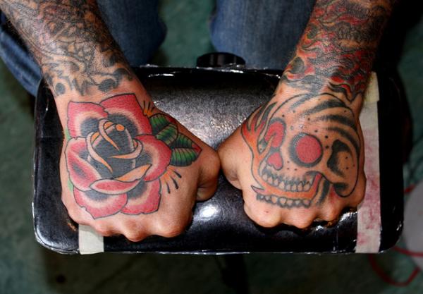 25 Frighteningly Cool Skeleton Hand Tattoo Designs