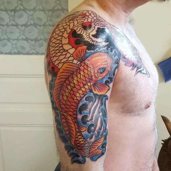 Japanese style Koi Fish tattoo on the left forearm