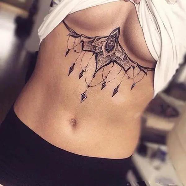 1. under chest tattoo