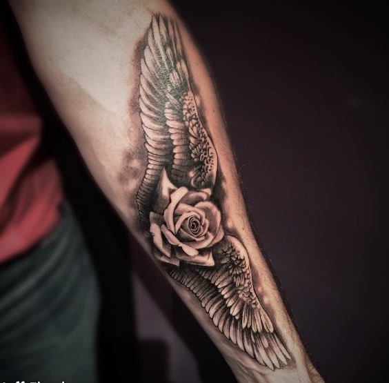 25 Stunning Angel Wing Tattoos For Men