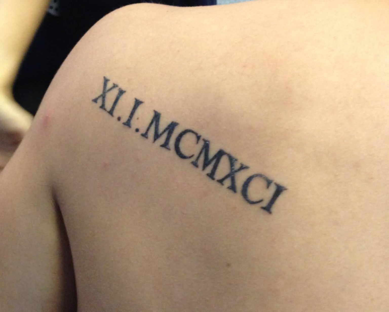 number 13 in roman numerals tattoo