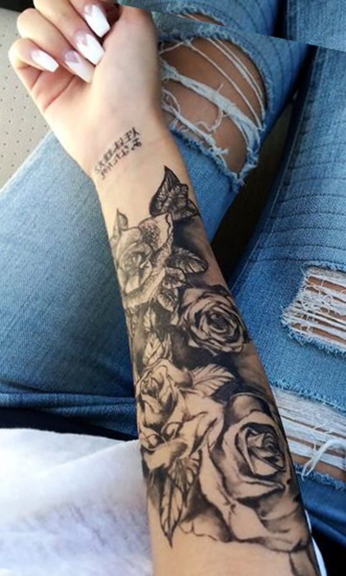 14. Rose Forearm Tattoo 