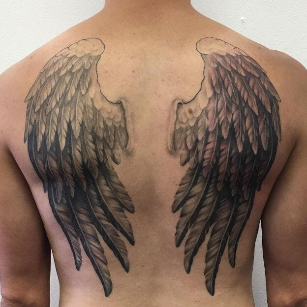 male back tattoo wings