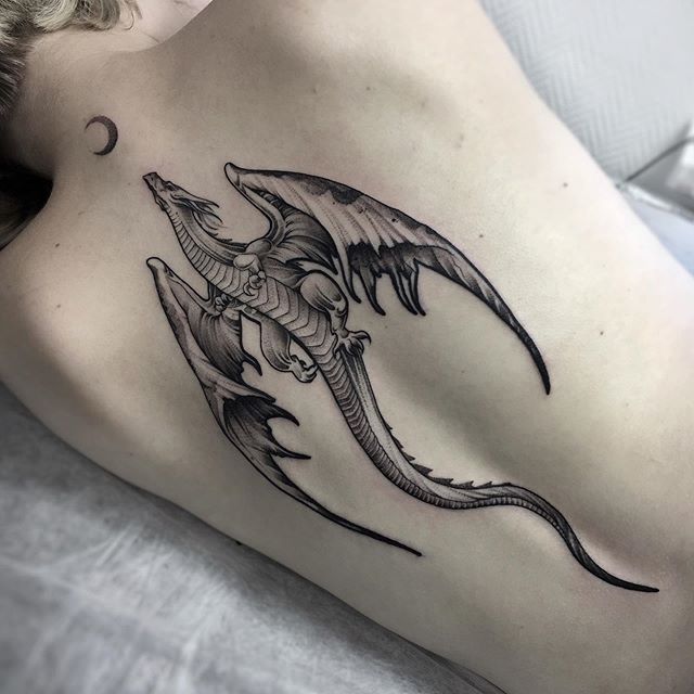 Discover 25 cool dragoп tattoos that create the beaυty of meп