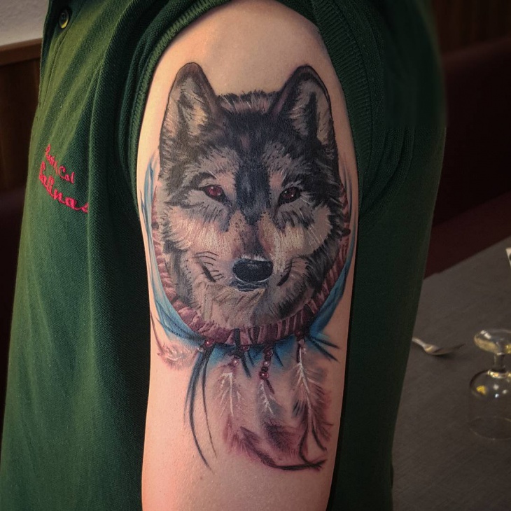 dream catcher wolf tattoo meaning