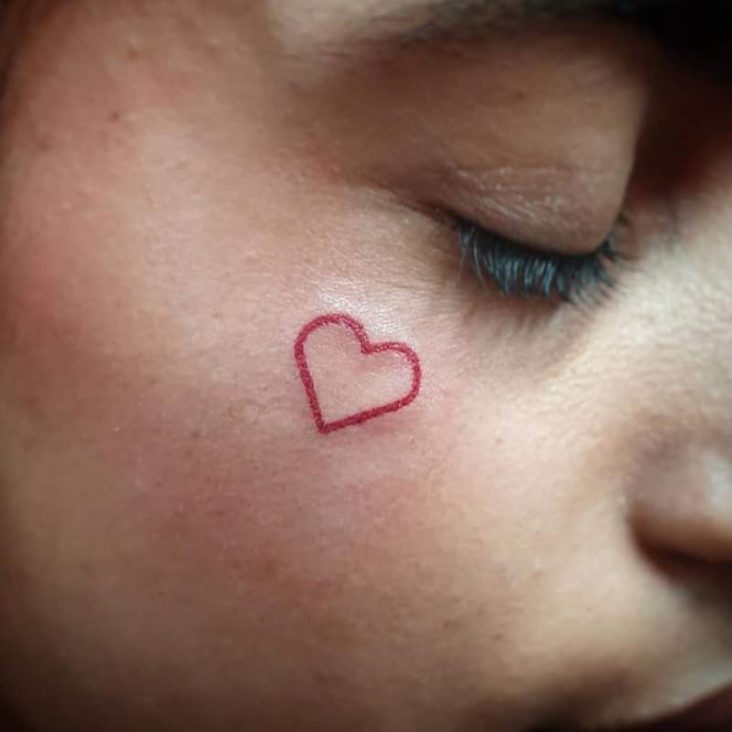 20 Face Tattoos For Men Who Just DGAF Pulptastic   5.heart .face .tattooo 732x732 