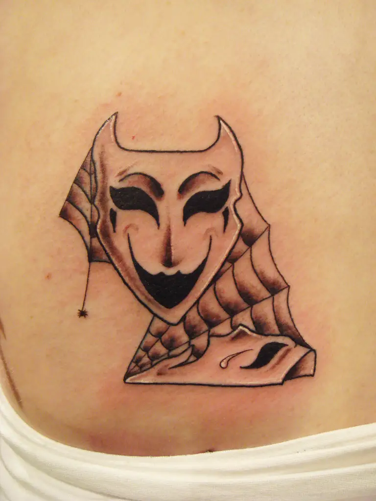 theatre chest tattoo