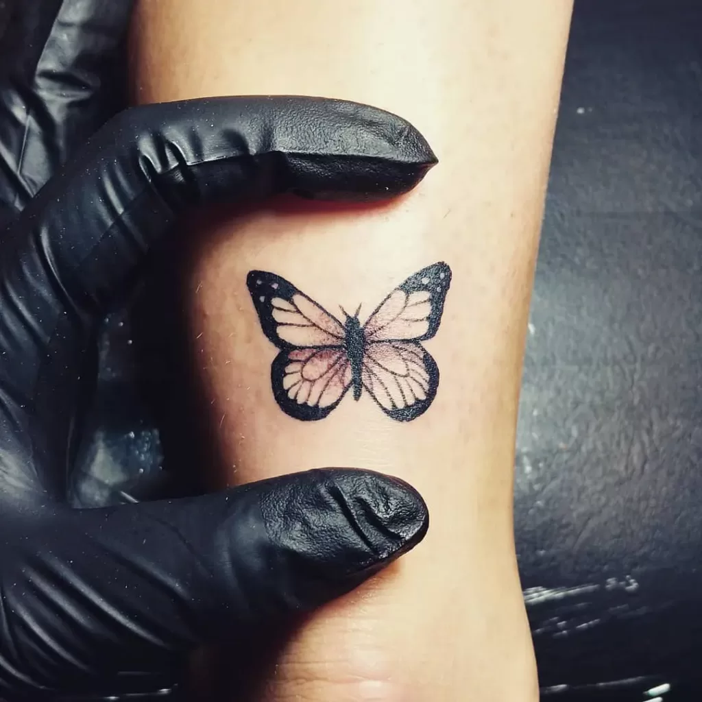 Cute Tiny Butterfly Tattoo Idea