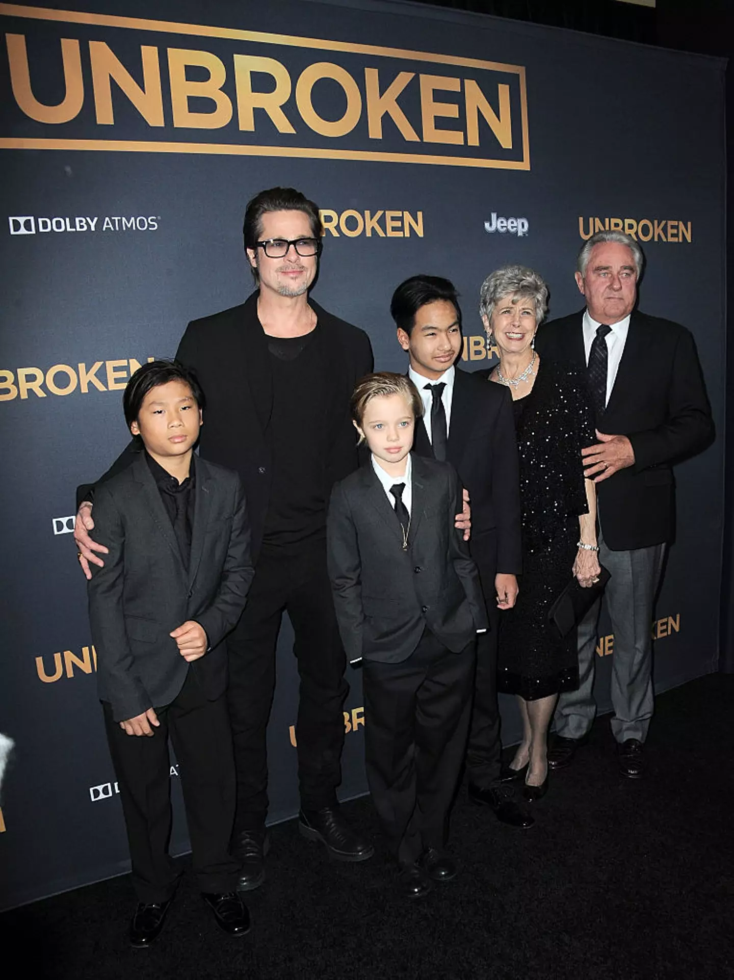 Brad Pitt with children Pax, Shiloh, Maddox and parent Jane Pitt and William Pitt. (Albert L. Ortega/Getty Images)