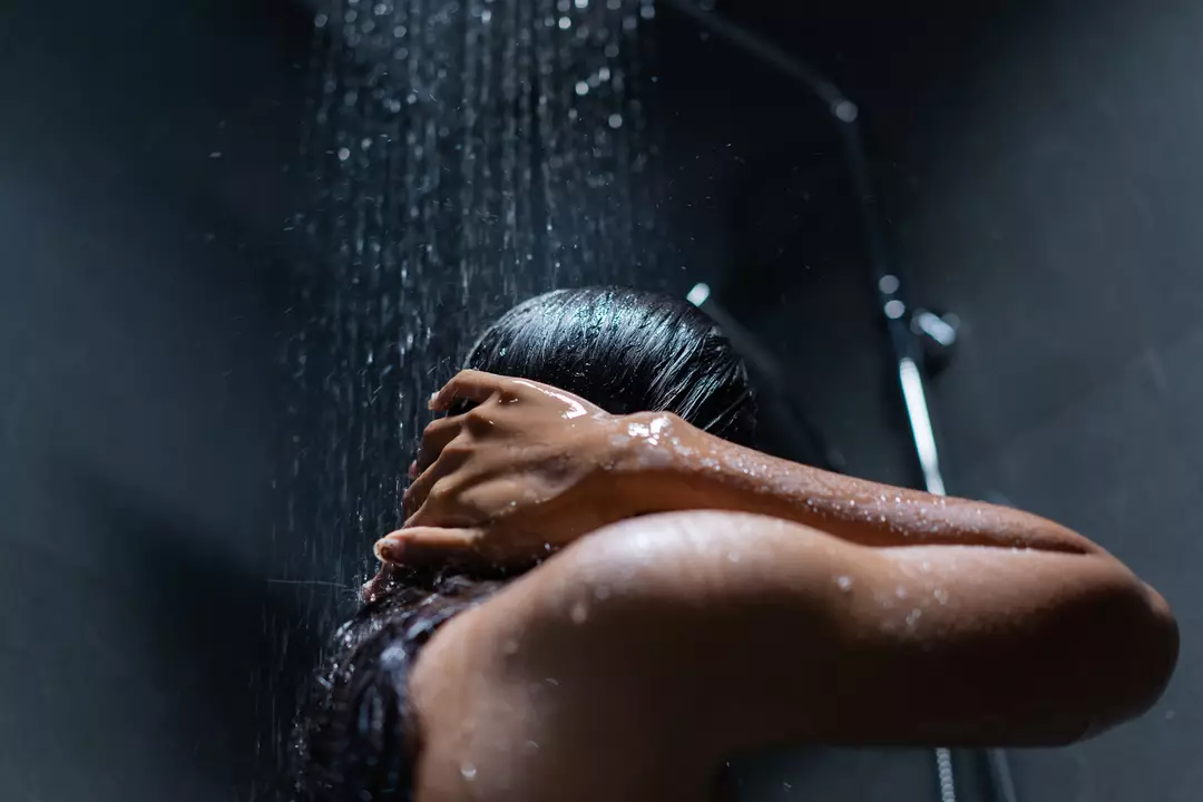 A dark shower before bedtime can improve sleep (Getty Stock)