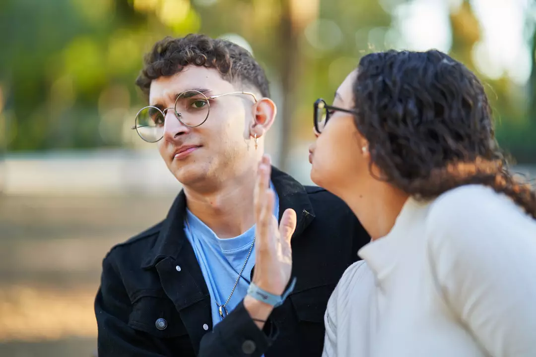 Couple pulling away from a kiss