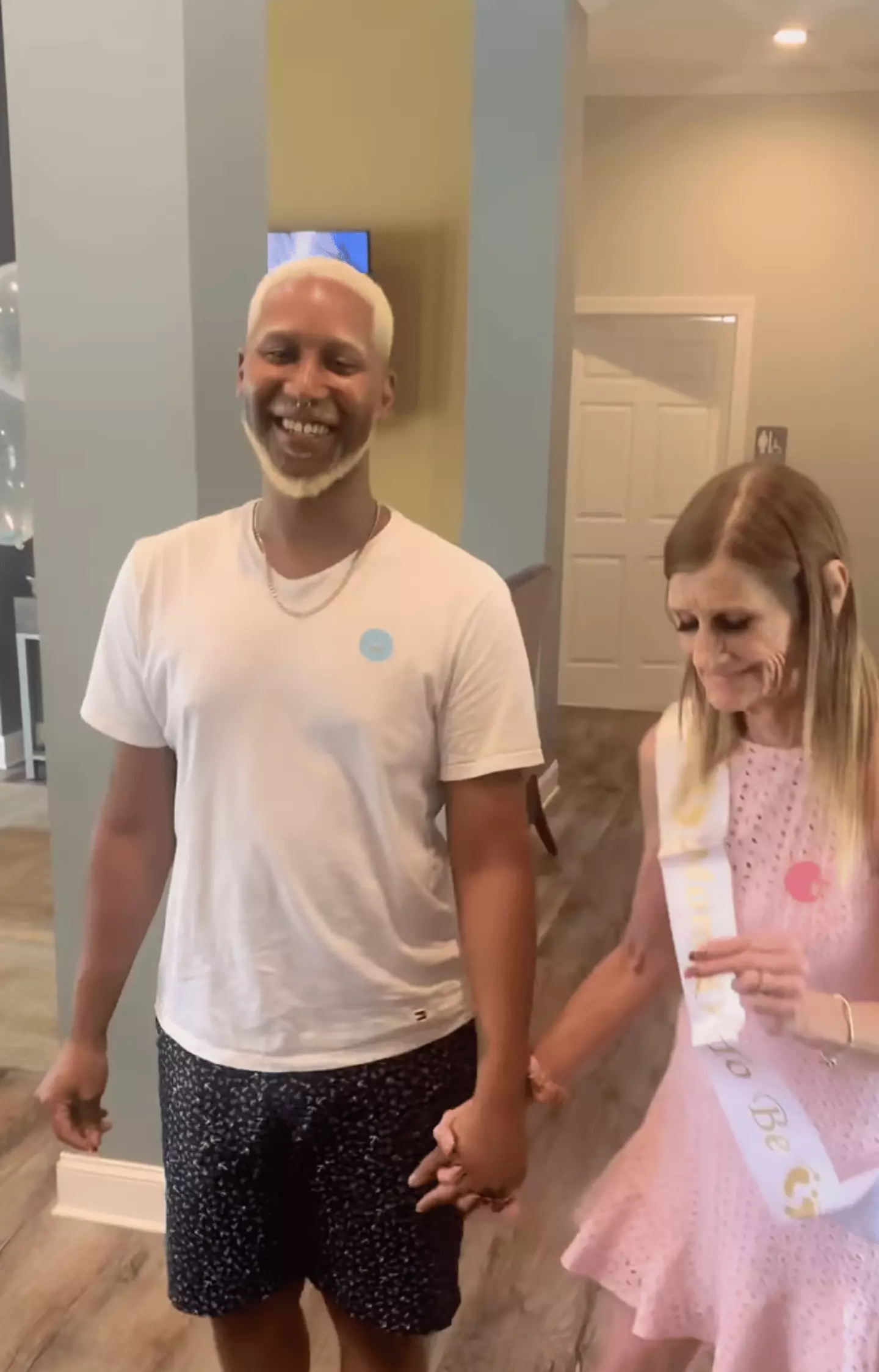 The pair recently revealed the gender of their baby, who they're welcoming via a surrogate. (TikTok/@therealoliver6060)
