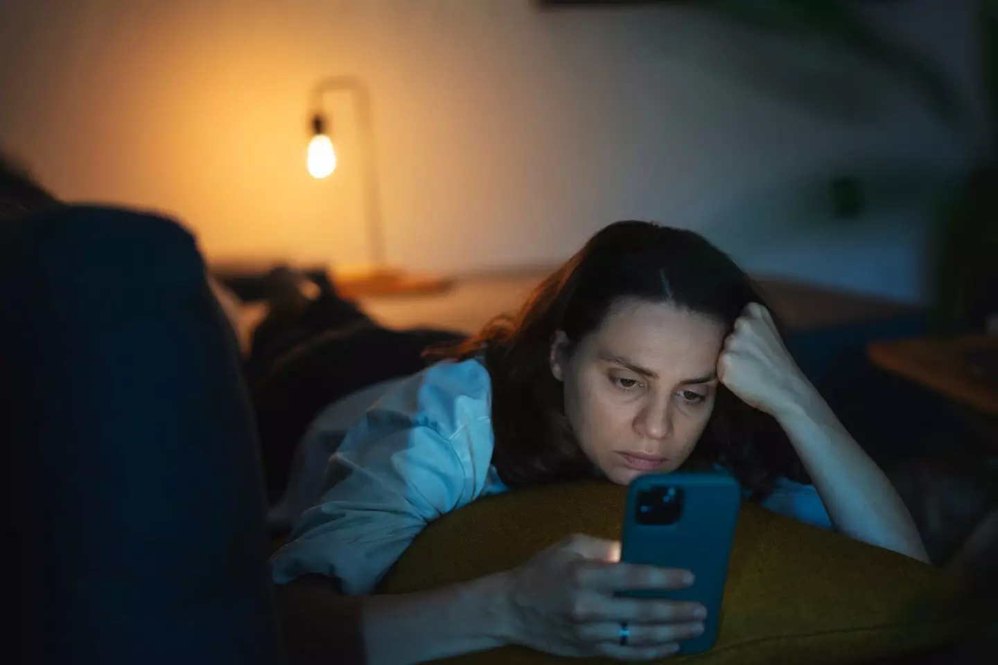 Doomscrolling is part of our society, but would you do anything to prevent yourself from mindlessly scrolling your phone? (Getty Stock Image)