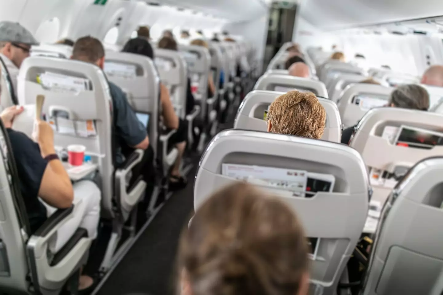 Feeling chilly on board your flight? There's a reason for that. (ViktorCap / Getty Images)