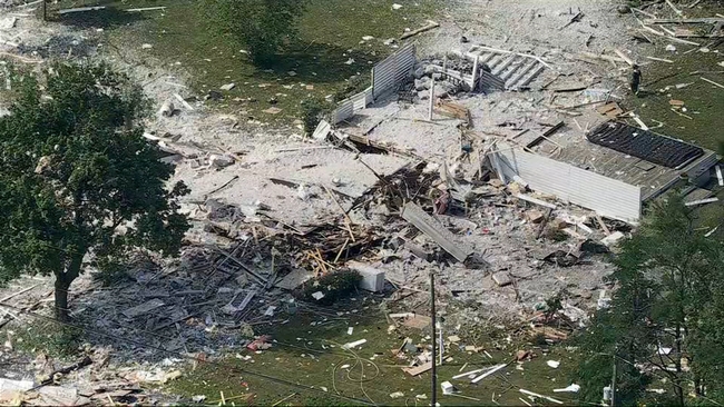 Damaged homes surrounding the blast site