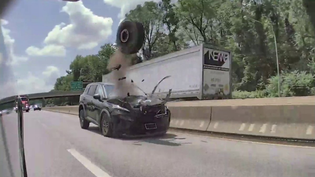 Loose tire flies across Philadelphia highway, pulverizes front end of SUV: wild dashcam