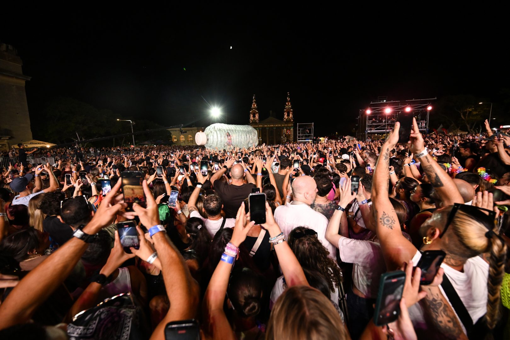 Perry waving the Maltese flag during her performance