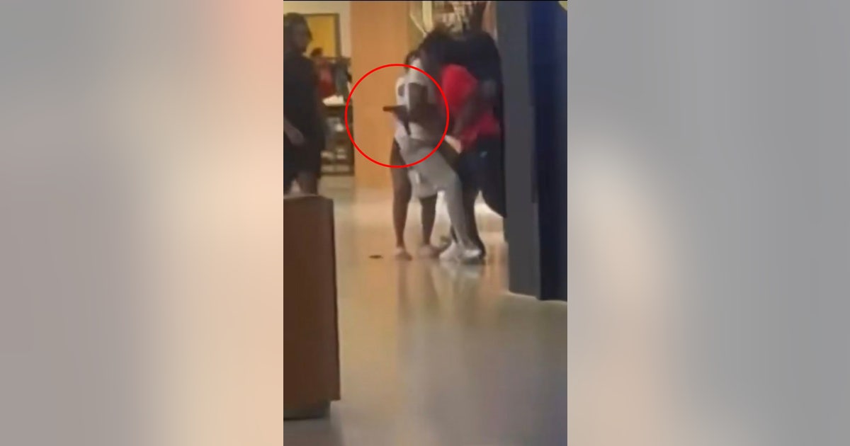 Police investigate a shopping mall shooting that left 2 dead in suburban Detroit