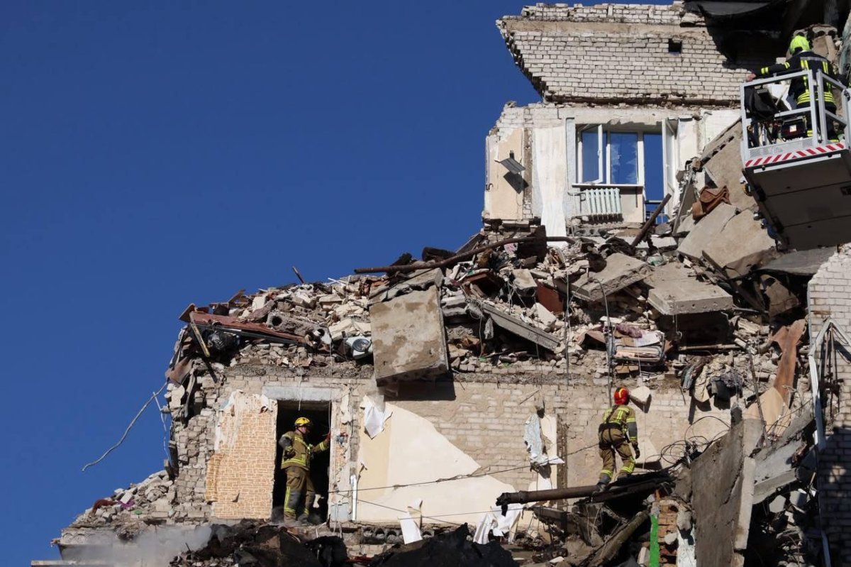 Russian attack kills at least 13, injures scores and causes damage across Ukraine capital