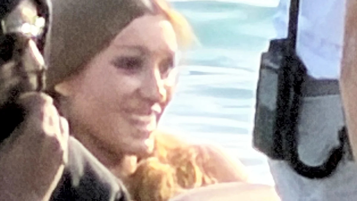 Bianca Censori in her nude bodysuit during the daytime beach outing