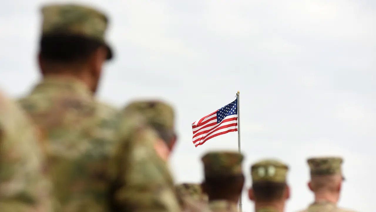 Space Force and Army personnel reviewing test data